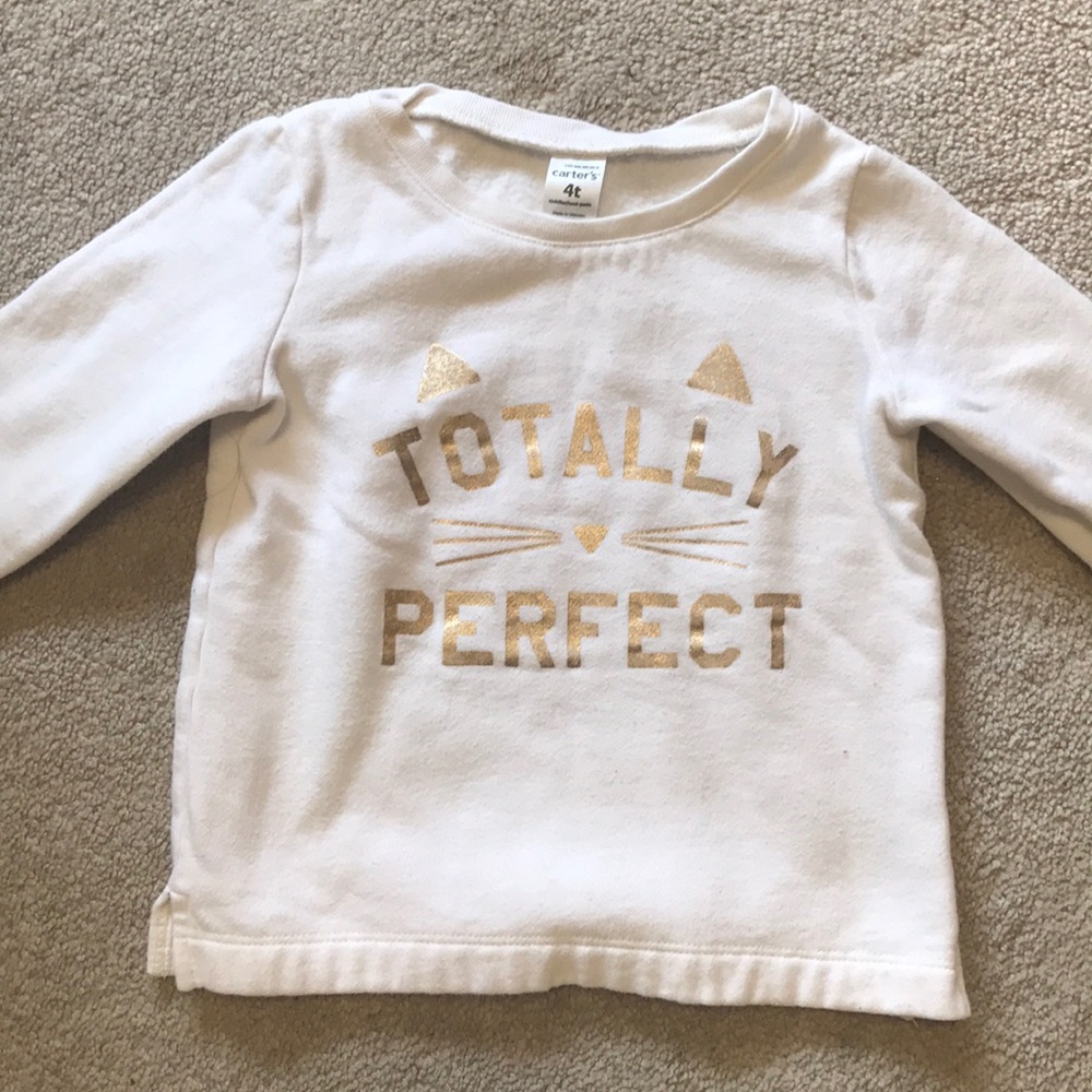 White warm shirt for a little girl.